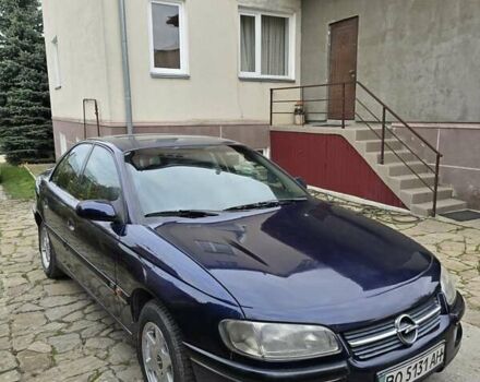 Синий Опель Омега, объемом двигателя 2.5 л и пробегом 296 тыс. км за 2700 $, фото 1 на Automoto.ua
