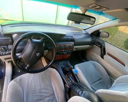 Синий Опель Омега, объемом двигателя 2 л и пробегом 400 тыс. км за 1700 $, фото 3 на Automoto.ua