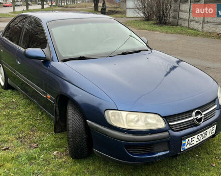 Синий Опель Омега, объемом двигателя 2 л и пробегом 320 тыс. км за 2577 $, фото 3 на Automoto.ua