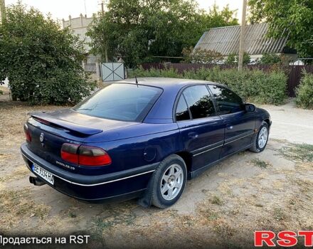 Синий Опель Омега, объемом двигателя 2.5 л и пробегом 293 тыс. км за 2800 $, фото 3 на Automoto.ua