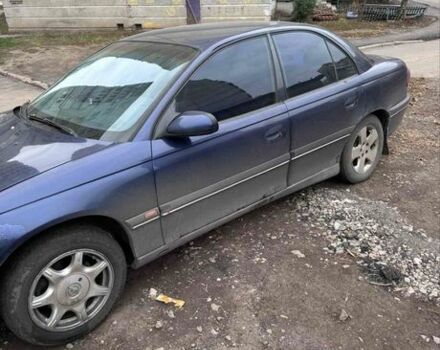 Синий Опель Омега, объемом двигателя 2 л и пробегом 280 тыс. км за 800 $, фото 1 на Automoto.ua