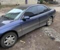 Синий Опель Омега, объемом двигателя 2 л и пробегом 280 тыс. км за 800 $, фото 1 на Automoto.ua