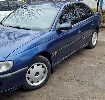 Синий Опель Омега, объемом двигателя 2 л и пробегом 300 тыс. км за 2000 $, фото 4 на Automoto.ua