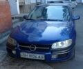 Синий Опель Омега, объемом двигателя 2.5 л и пробегом 289 тыс. км за 1600 $, фото 2 на Automoto.ua