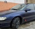 Синий Опель Омега, объемом двигателя 2 л и пробегом 380 тыс. км за 1350 $, фото 1 на Automoto.ua
