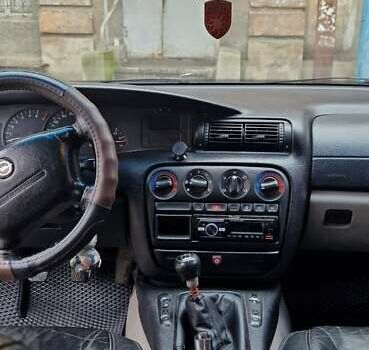 Синий Опель Омега, объемом двигателя 2 л и пробегом 300 тыс. км за 2000 $, фото 3 на Automoto.ua