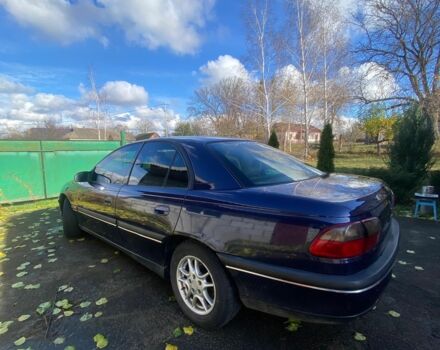 Синий Опель Омега, объемом двигателя 2 л и пробегом 400 тыс. км за 1700 $, фото 1 на Automoto.ua