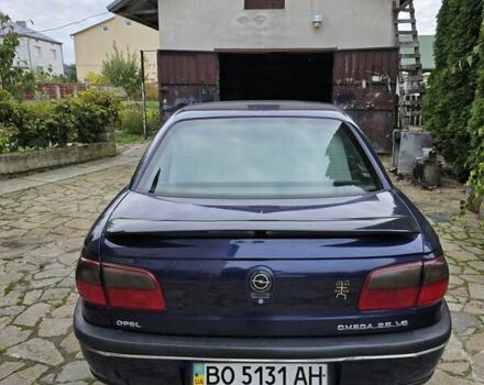 Синий Опель Омега, объемом двигателя 2.5 л и пробегом 296 тыс. км за 2700 $, фото 3 на Automoto.ua