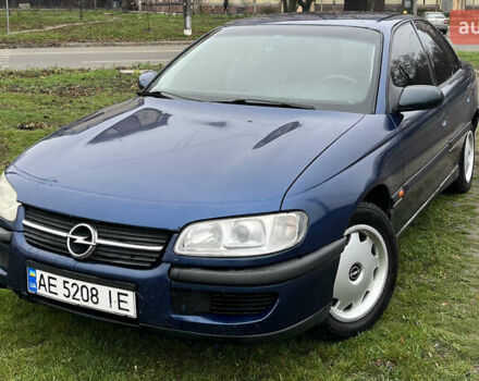 Синий Опель Омега, объемом двигателя 2 л и пробегом 320 тыс. км за 2577 $, фото 1 на Automoto.ua