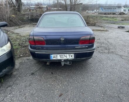 Синій Опель Омега, об'ємом двигуна 2.5 л та пробігом 300 тис. км за 700 $, фото 4 на Automoto.ua