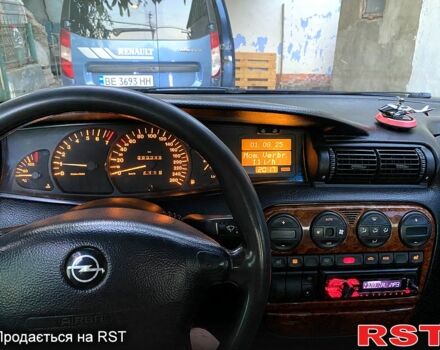 Синий Опель Омега, объемом двигателя 2.5 л и пробегом 293 тыс. км за 2800 $, фото 7 на Automoto.ua