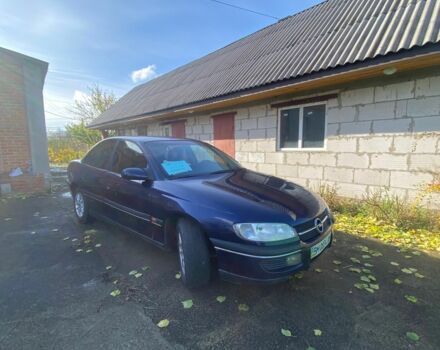 Синий Опель Омега, объемом двигателя 2 л и пробегом 400 тыс. км за 1700 $, фото 9 на Automoto.ua