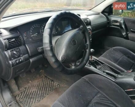 Синий Опель Омега, объемом двигателя 2 л и пробегом 200 тыс. км за 2100 $, фото 4 на Automoto.ua