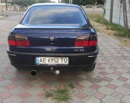 Синий Опель Омега, объемом двигателя 2.5 л и пробегом 385 тыс. км за 3400 $, фото 4 на Automoto.ua