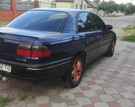 Синий Опель Омега, объемом двигателя 2.5 л и пробегом 385 тыс. км за 3400 $, фото 2 на Automoto.ua