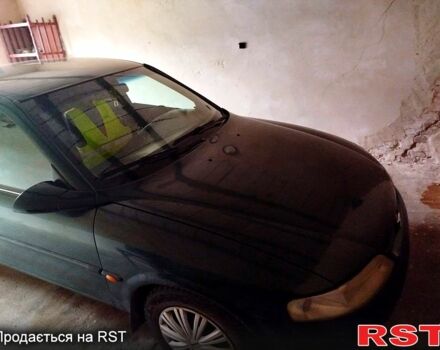 Синий Опель Омега, объемом двигателя 1.8 л и пробегом 100 тыс. км за 2500 $, фото 1 на Automoto.ua