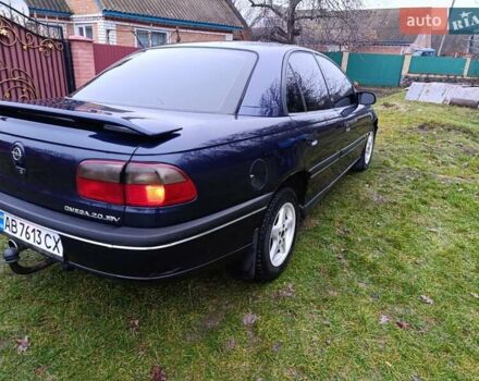 Синий Опель Омега, объемом двигателя 2 л и пробегом 260 тыс. км за 2400 $, фото 4 на Automoto.ua