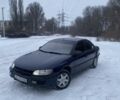 Синий Опель Омега, объемом двигателя 2 л и пробегом 275 тыс. км за 2100 $, фото 5 на Automoto.ua