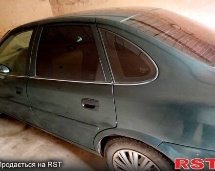 Синий Опель Омега, объемом двигателя 1.8 л и пробегом 100 тыс. км за 2500 $, фото 7 на Automoto.ua