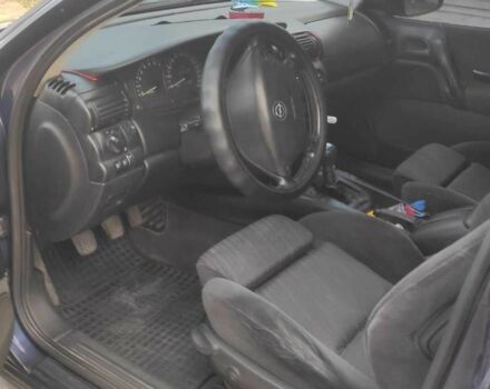 Синий Опель Омега, объемом двигателя 2.5 л и пробегом 385 тыс. км за 3400 $, фото 5 на Automoto.ua