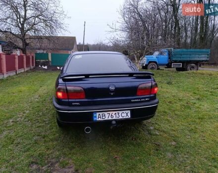 Синий Опель Омега, объемом двигателя 2 л и пробегом 260 тыс. км за 2400 $, фото 3 на Automoto.ua