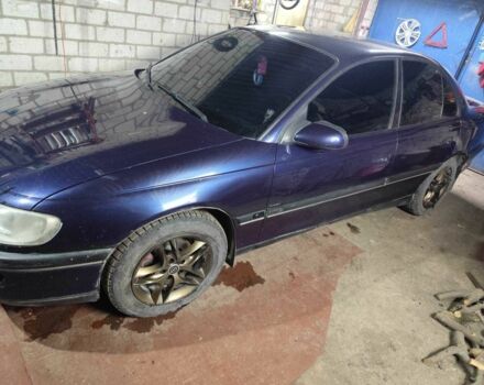 Синий Опель Омега, объемом двигателя 2.5 л и пробегом 385 тыс. км за 3400 $, фото 8 на Automoto.ua