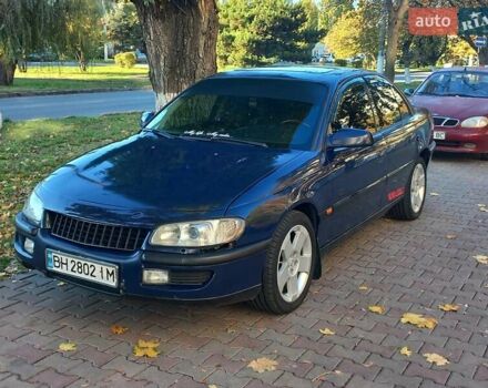 Синий Опель Омега, объемом двигателя 2.5 л и пробегом 285 тыс. км за 2400 $, фото 2 на Automoto.ua