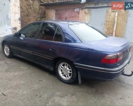 Синій Опель Омега, об'ємом двигуна 2 л та пробігом 294 тис. км за 2000 $, фото 28 на Automoto.ua