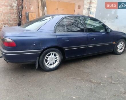 Синій Опель Омега, об'ємом двигуна 2 л та пробігом 294 тис. км за 2000 $, фото 10 на Automoto.ua