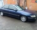Синій Опель Омега, об'ємом двигуна 2 л та пробігом 294 тис. км за 2000 $, фото 14 на Automoto.ua