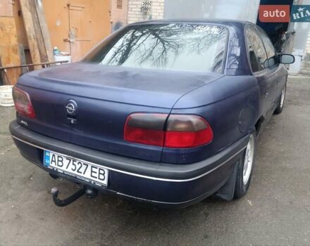 Синій Опель Омега, об'ємом двигуна 2 л та пробігом 294 тис. км за 2000 $, фото 11 на Automoto.ua
