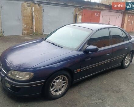 Синій Опель Омега, об'ємом двигуна 2 л та пробігом 294 тис. км за 2000 $, фото 18 на Automoto.ua