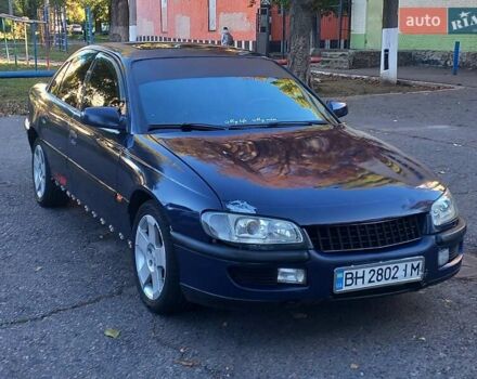 Синий Опель Омега, объемом двигателя 2.5 л и пробегом 285 тыс. км за 2400 $, фото 10 на Automoto.ua