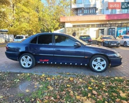Синий Опель Омега, объемом двигателя 2.5 л и пробегом 285 тыс. км за 2400 $, фото 9 на Automoto.ua