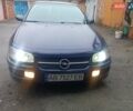 Синій Опель Омега, об'ємом двигуна 2 л та пробігом 294 тис. км за 2000 $, фото 1 на Automoto.ua