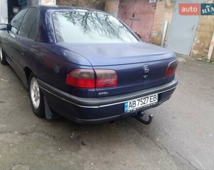 Синій Опель Омега, об'ємом двигуна 2 л та пробігом 294 тис. км за 2000 $, фото 12 на Automoto.ua