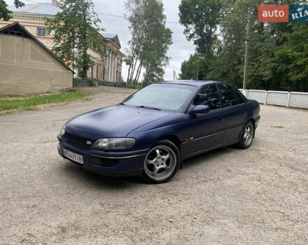 Синий Опель Омега, объемом двигателя 2 л и пробегом 350 тыс. км за 2500 $, фото 7 на Automoto.ua