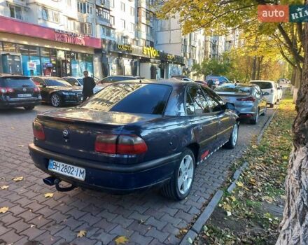 Синий Опель Омега, объемом двигателя 2.5 л и пробегом 285 тыс. км за 2400 $, фото 8 на Automoto.ua