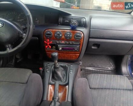 Синій Опель Омега, об'ємом двигуна 2 л та пробігом 294 тис. км за 2000 $, фото 26 на Automoto.ua