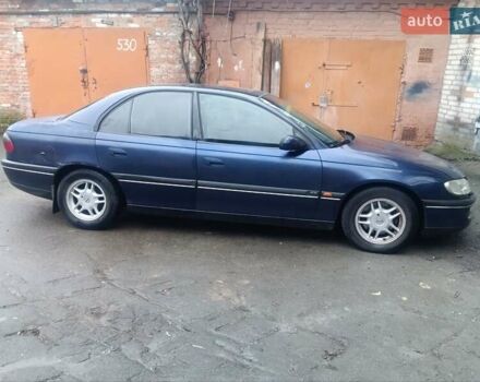 Синій Опель Омега, об'ємом двигуна 2 л та пробігом 294 тис. км за 2000 $, фото 13 на Automoto.ua