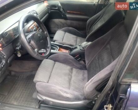 Синій Опель Омега, об'ємом двигуна 2 л та пробігом 294 тис. км за 2000 $, фото 3 на Automoto.ua