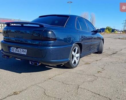 Синий Опель Омега, объемом двигателя 3 л и пробегом 350 тыс. км за 4500 $, фото 2 на Automoto.ua