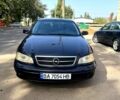 Синий Опель Омега, объемом двигателя 2.5 л и пробегом 250 тыс. км за 2400 $, фото 1 на Automoto.ua
