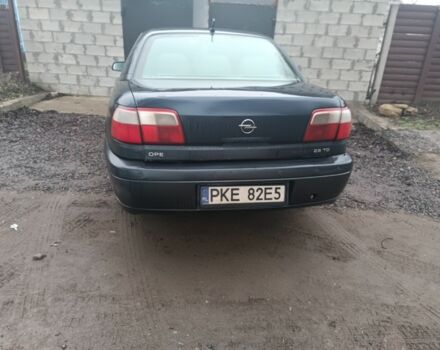 Синий Опель Омега, объемом двигателя 2.5 л и пробегом 250 тыс. км за 2200 $, фото 1 на Automoto.ua