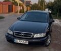Синий Опель Омега, объемом двигателя 2.5 л и пробегом 290 тыс. км за 1789 $, фото 1 на Automoto.ua