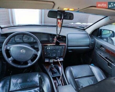 Синий Опель Омега, объемом двигателя 2.2 л и пробегом 273 тыс. км за 2999 $, фото 6 на Automoto.ua