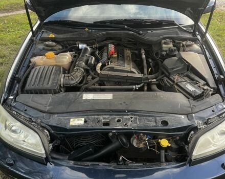 Синий Опель Омега, объемом двигателя 2.2 л и пробегом 233 тыс. км за 2750 $, фото 9 на Automoto.ua