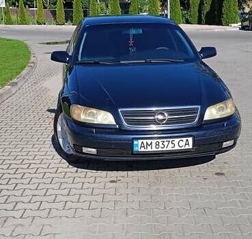 Синий Опель Омега, объемом двигателя 2.2 л и пробегом 350 тыс. км за 3100 $, фото 9 на Automoto.ua
