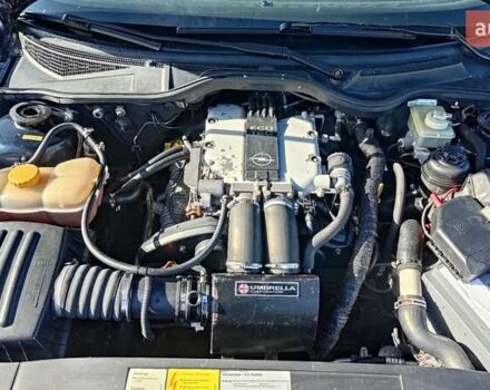 Синий Опель Омега, объемом двигателя 3 л и пробегом 350 тыс. км за 4500 $, фото 4 на Automoto.ua