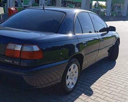 Синий Опель Омега, объемом двигателя 2.2 л и пробегом 350 тыс. км за 3100 $, фото 4 на Automoto.ua